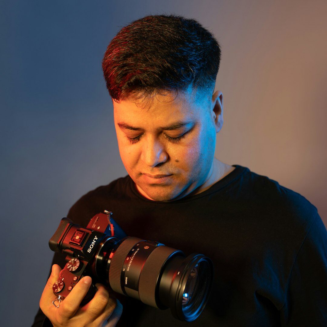Studio portrait of an Argentine man chief photographer in his forties
