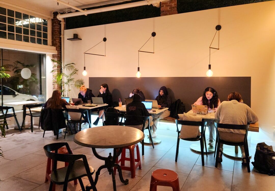 diverse readers in cafe